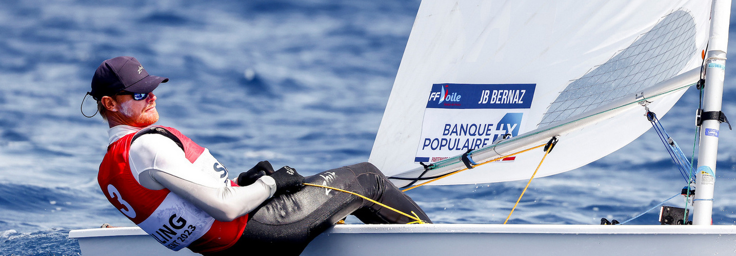 Jean-Baptiste Bernaz (ILCA 7) Jean-Baptiste Bernaz durant une épreuve de voile
